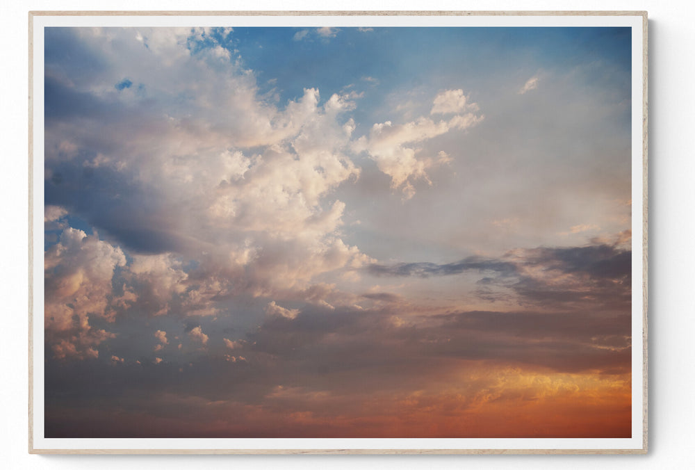 Minimalist photograph of clouds building over the Athens sky in afternoon light