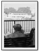 Load image into Gallery viewer, Black and white photograph of a woman and child on London South Bank, city life continuing around them