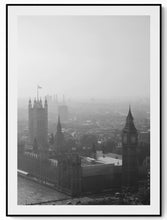 Load image into Gallery viewer, Aerial black and white photograph of London in fog, Big Ben and Westminster Bridge visible through cloud
